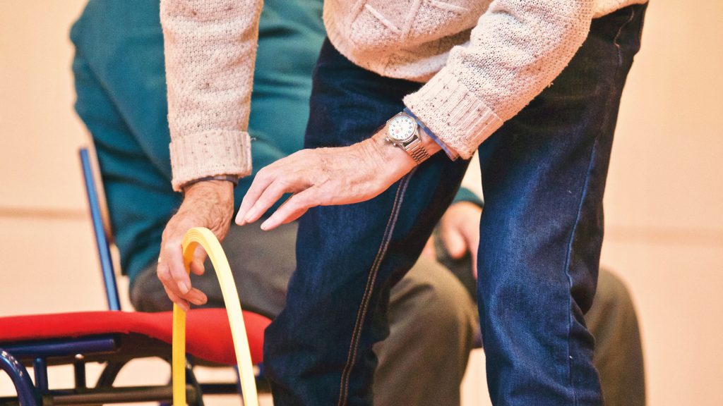 elderly person doing physical therapy